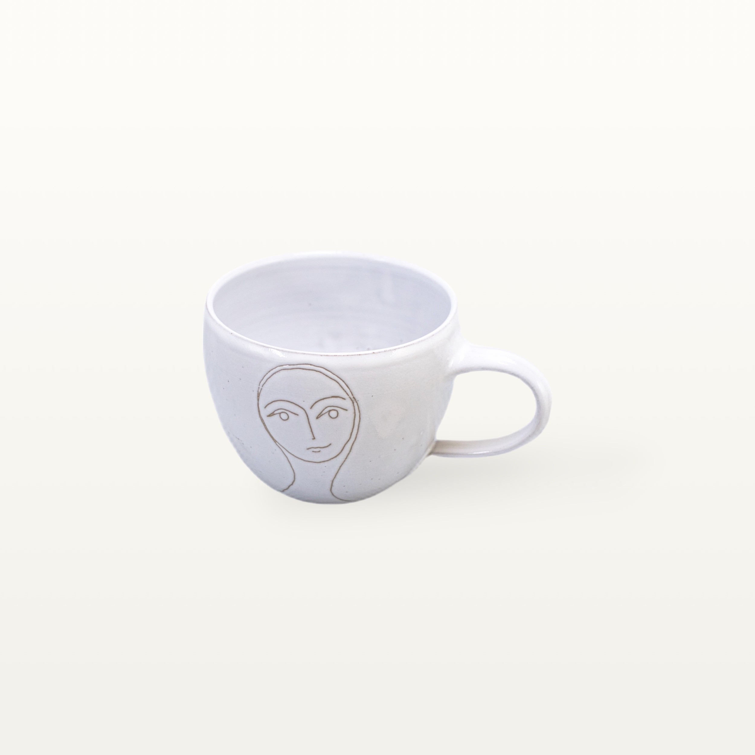 Cappuccinotassen "Gesichtspunkte" - Frauengesicht 1 Cappuccinotassen "Gesichtspunkte" - Frauengesicht